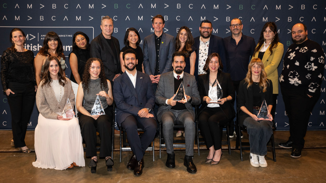 Recipients of the 2025 BCAMA Marketing Excellence Awards, including Dana Bina, holding their trophies at the British Columbia American Marketing Association ceremony